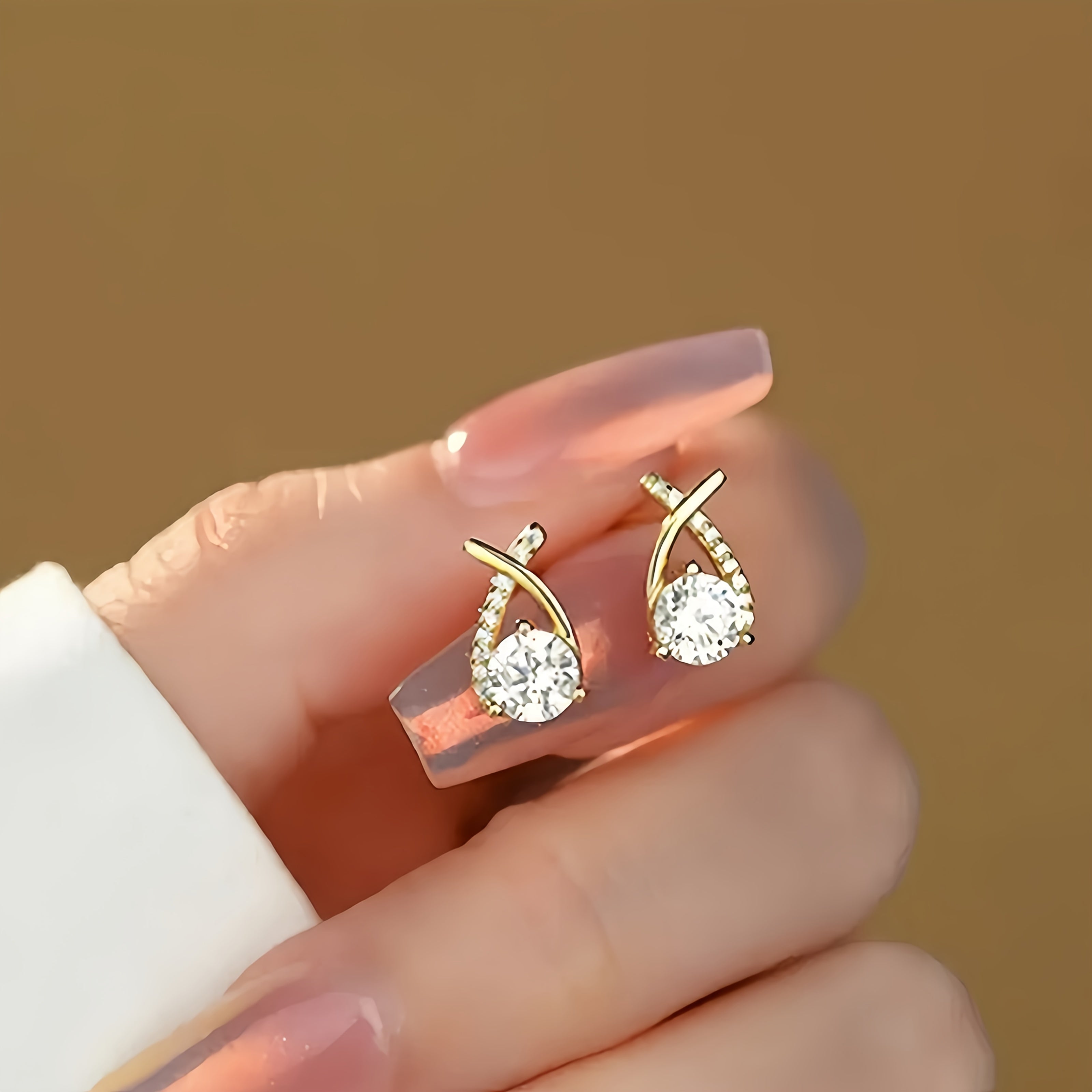 Oorbellen met Gouden Kruis en Zirconia