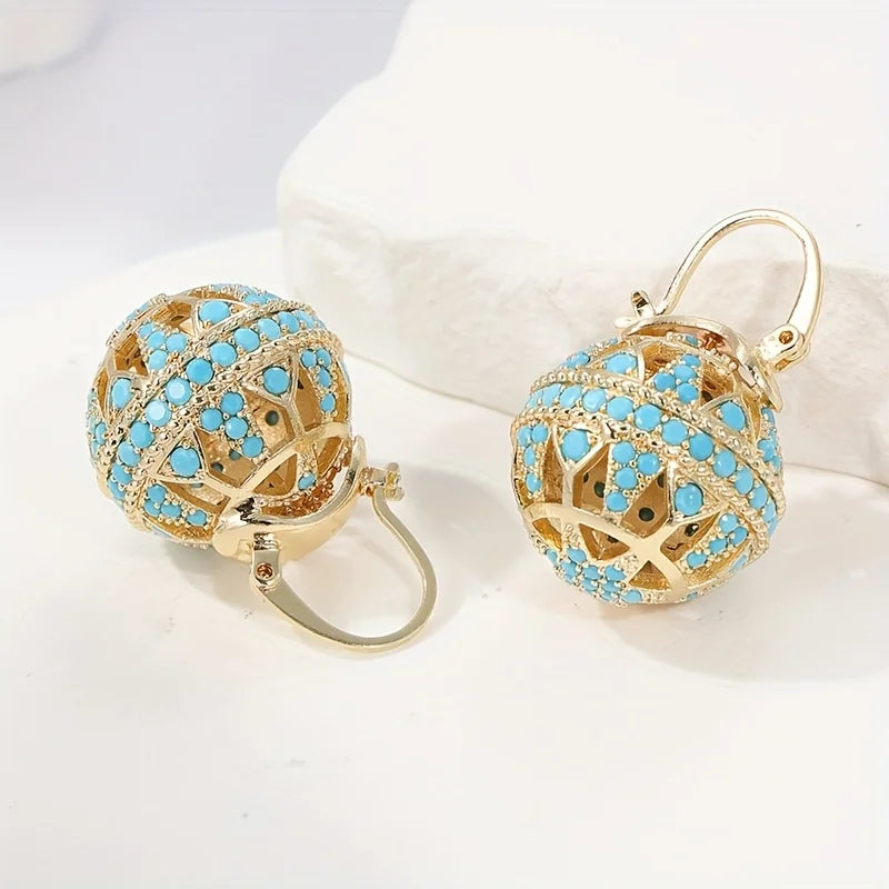 Vergulde turquoise mandala-oorbellen