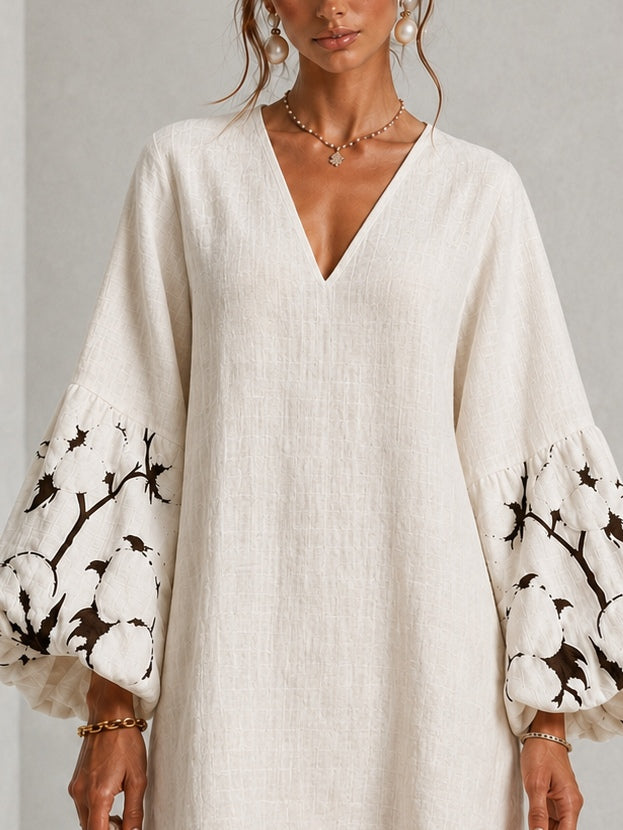 Mirelle | Lantaarnmouwen jurk met V-hals en bloemenprint