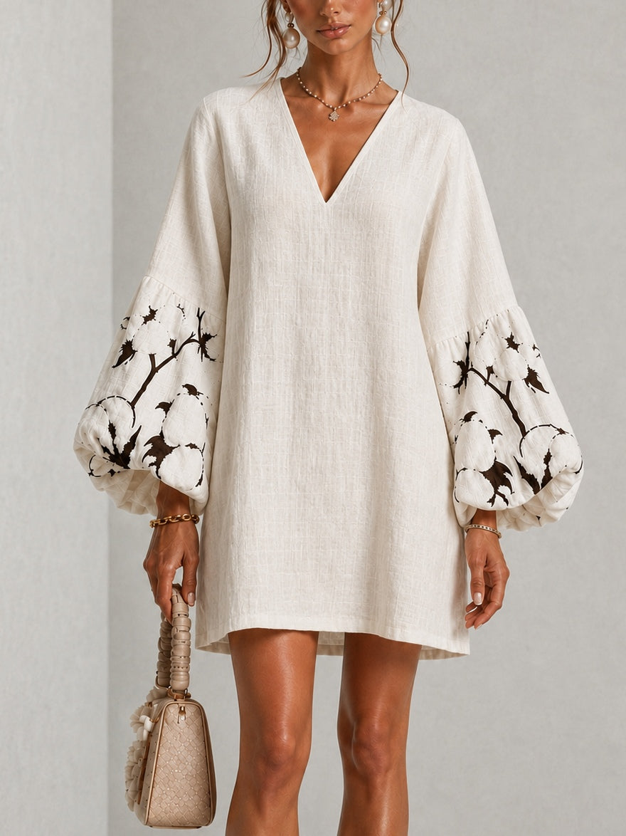 Mirelle | Lantaarnmouwen jurk met V-hals en bloemenprint