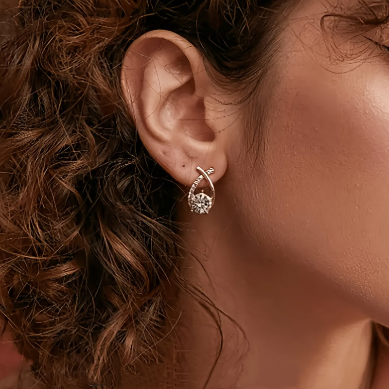 Oorbellen met Gouden Kruis en Zirconia