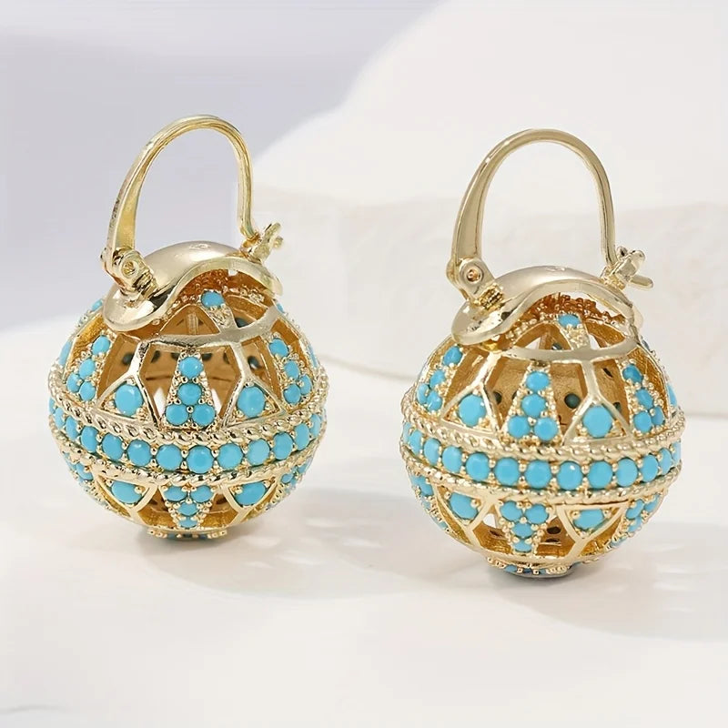 Vergulde turquoise mandala-oorbellen