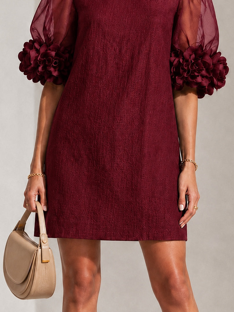 Amaris | Organza jurk met pofmouwen en bloemenmotief