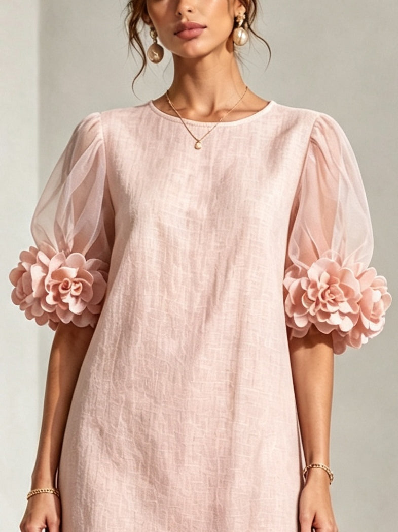 Amaris | Organza jurk met pofmouwen en bloemenmotief