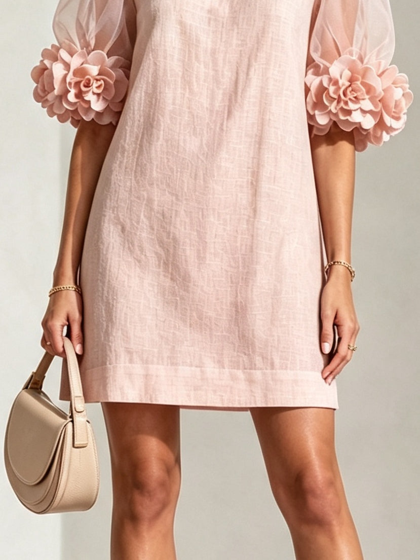 Amaris | Organza jurk met pofmouwen en bloemenmotief