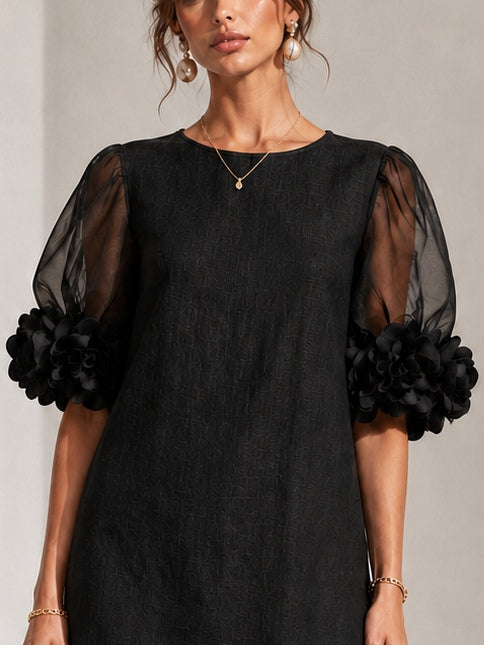 Amaris | Organza jurk met pofmouwen en bloemenmotief