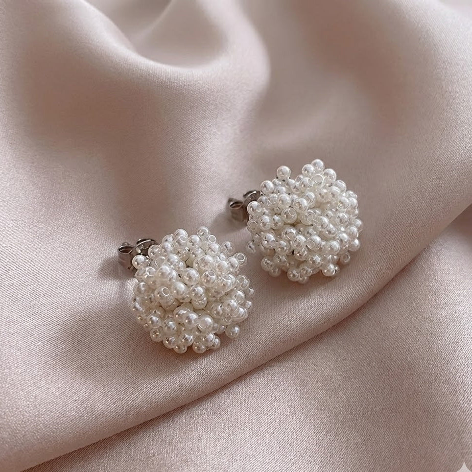 Elegante oorbellen met ingelegde parels